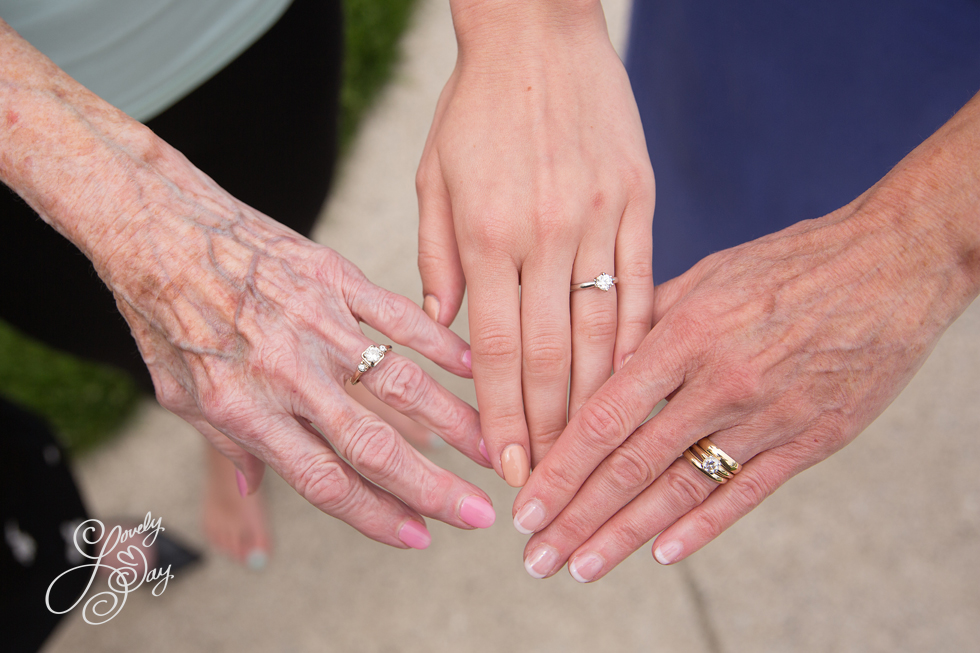 Grandma's hand, Moms hand, Brides hand showing off wedding rings