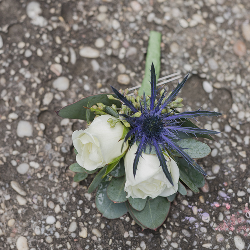 boutonniere made by Blossoms & Treasures